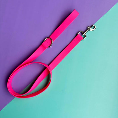 Arnés para perros en goma impermeable fucsia y verde neón con correa