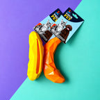 Juguete banana dispensador de premios para perros y gatos en amarillo y naranja