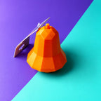 Juguete pera dispensador de premios color naranja