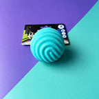 Pelota maciza aguamarina para perros con textura de ondas